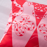 Snazzy Snakes Red & Pink velvet cushion cover - Close up view
